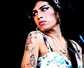 Image 78In 2008, Amy Winehouse tied the then record for the most wins by a female artist in a single night and became the first British woman to win five Grammys. (from 2000s in music)