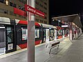 An Alstom Citadis 305 at the station at night in May 2020