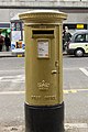 Chris Hoy's 2012 Summer Olympics and Paralympics golden post box on Hanover Street, Edinburgh. April 2013.