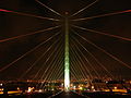 Puente Atirantado, as it is called by the locals, at night, during September festivities adorned with the colors of the Mexican flag.