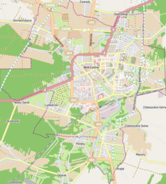 Mapa konturowa Bełchatowa, blisko centrum u góry znajduje się punkt z opisem „Zbór Kościoła Adwentystów Dnia Siódmego w Bełchatowie”