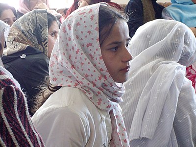 An Afghan girl wears an Islamic style scarf at the International Women's Day celebration in Pajshir in 2008.