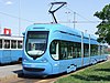 A new CROTRAM tram with an older tram in the background