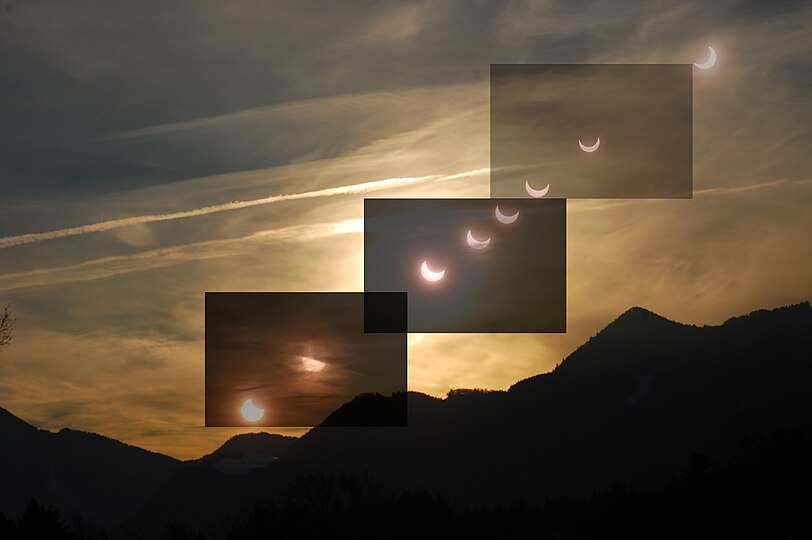 Partielle Sonnenfinsternis nach Sonnenaufgang am 4. Januar 2011, Fotomontage des Verlaufs zwischen Anfang etwa bei Sonnenaufgang und etwa der Finsternismitte.
