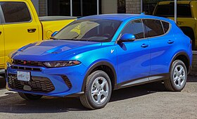 Front left view of a blue American compact crossover SUV built in Italy