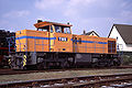 V 156 (MaK G 1205 BB) in DEG-Orange mit blauen Zierstreifen