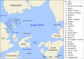 Symbols of ships are arrayed in a portion of water mostly surrounded by land.