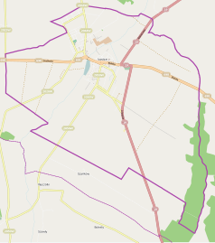 Mapa konturowa Łosic, u góry znajduje się punkt z opisem „Parafia Trójcy Świętej”