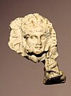 Alexander-Heracles head, Takht-i Sangin, Temple of the Oxus, 3rd century BCE.[45]