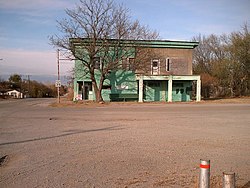 The Shamrock Museum building was originally a general store.[1] Building from 1927, said to be an abandoned auto dealership.[1]