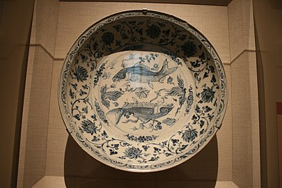 Dish. Stoneware with white slip and cobalt pigment under colorless glaze. Red River Delta kilns, Lê dynasty, 15th-century