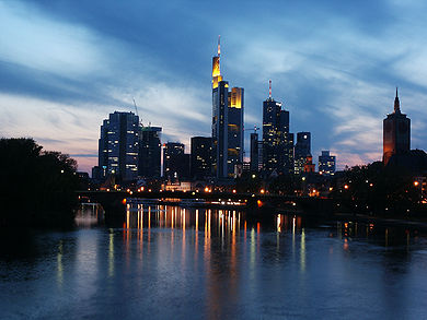 Medieval church towers and modern skyline