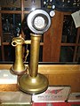 A candlestick phone