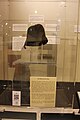 Monmouth cap display at Monmouth Museum with QRpedia code