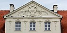 Architectural decorations on the facade of the Łuszczewski Palace