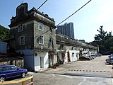 Tsang Tai Uk; It is a distinctively Lingnan building, with the use of "wok yi uk" (walls protruding vertically from both ends of the roof).