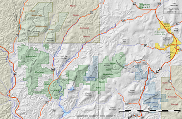 The contiguous Taum Sauk Mountain and Johnson's Shut-ins state parks consist of 16,050 acres (65.0 km2) in the Missouri Ozarks.