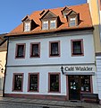 Wohnhaus in geschlossener Bebauung (Café Winkler)