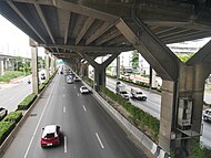 Vibhavadhi Rangsit Road with Don Mueang Tollway above.