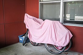 Bikes under a sheet