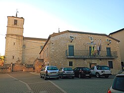 Plaza de la Constitución in Prádena, view of the Church of San Martín and the town hall, seat of the city council