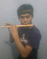 Seorang pemain bangsing (suling)