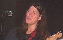 Kim Deal performing in 2008