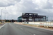 A metal frame of a railway station being constructed