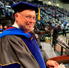 Dr. David Weindorf attending graduation at Central Michigan University