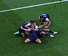 Lloyd (second from left) celebrates with United States women's national soccer teammates Kelley O'Hara, Alex Morgan, and Abby Wambach after scoring a goal during the 2012 Olympic final.