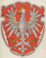 Herb województwa krakowskiego w wykonaniu Stanisława Eljasz-Radzikowskiego na jednej z pocztówek wydanych przez Towarzystwo Szkoły Ludowej (1910).