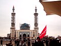 An angry mob outside the mosque