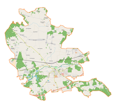 Mapa konturowa gminy Łask, blisko centrum na dole znajduje się punkt z opisem „Nowy Młyn”