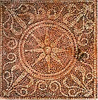 Mosaic depicting the Macedonian sun, Ai Khanoum, 2nd century BC.