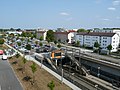 Oostelijke stationsuitgang en Park-and-Ride-parkeerterrein