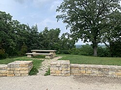 Inspiration Point Wayside Rest: Walls and benches in NPS Rustic style, overlooking the forested Root River Valley