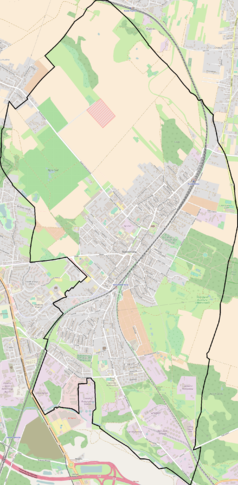 Mapa konturowa Radzionkowa, po prawej nieco u góry znajduje się punkt z opisem „Centrum Dokumentacji Deportacji Górnoślązaków w Radzionkowie”