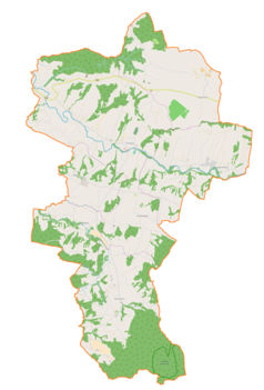 Mapa konturowa gminy Trzciana, blisko prawej krawiędzi nieco u góry znajduje się punkt z opisem „Cmentarz wojenny nr 305 –Łąkta Dolna”