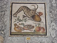 Ancient Roman mosaic with a striped cat attacking a chicken on top and two ducks on the bottom. (In the Vatican Museums).