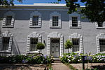 This land formed part of the original Drostdy property which was subdivided in 1799. The house is a Georgian double-storeyed building dating from the middle of the last century and is architecturally outstanding. This land formed part of the original Drostdy property which was subdivided in 1799. The house is a Georgian double-storeyed building dating from the middle of the last century and is architecturally outstanding.