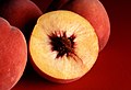 Image 9Autumn Red Peach  4, cross section showing freestone variety