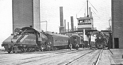 Locomotive with slopeback tender, loading the Sunset Limited onto the train-ferry Solano at Port Costa, San Francisco, Southern Pacific R.R.