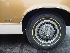 Narrow gold stripe performance tire from the 1960s