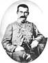 Old picture of an American Civil War general with dark hair and mustache