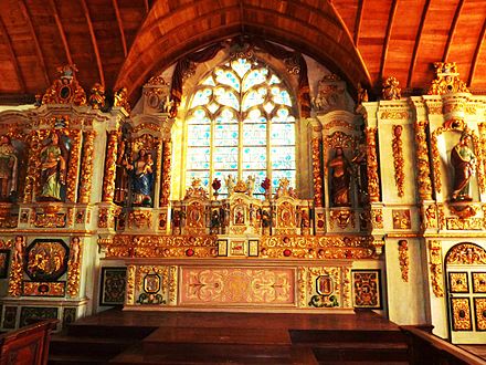 The sumptuous altarpiece of the main altar in the Sainte-Marie du Ménez-Hom chapel