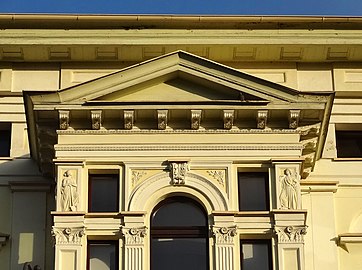 Pediment and two allegoric bas-reliefs