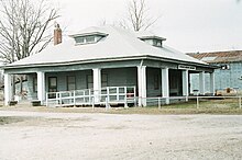 A large gray building serving as a museum.