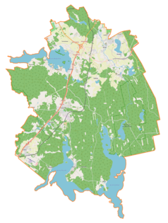 Mapa konturowa gminy Stawiguda, po prawej znajduje się owalna plamka nieco zaostrzona i wystająca na lewo w swoim dolnym rogu z opisem „Ustrych”