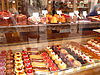 A display of pastries in a pâtisserie.