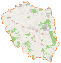 Mapa konturowa powiatu tureckiego, w centrum znajduje się punkt z opisem „Elektrownia Adamów”